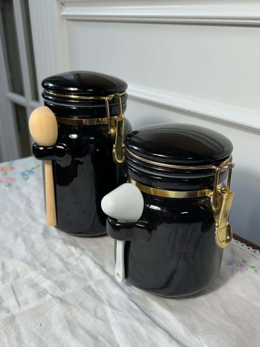 Vintage Black Ceramic Canister Pair with Mixed Spoons
